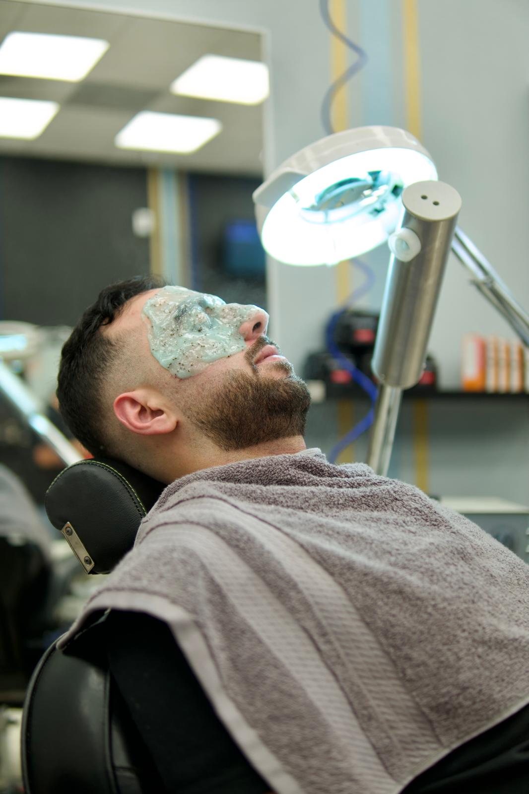 Man in barbershop facial mask | KJ Barbershop